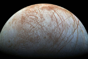 Jupiter`s moon Europa may expel water plumes from under icy shell - Nasa